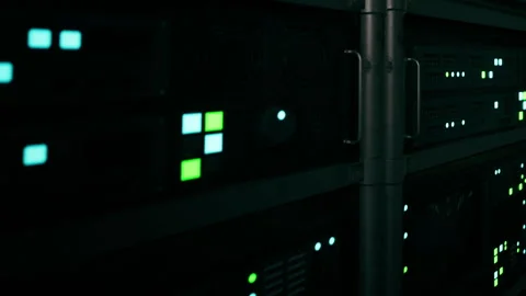 Glowing Lights of a Data Center Illuminate Dark Surroundings at Night Stock Footage 348722170