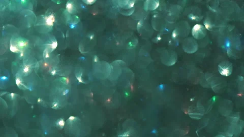 Glowing Lights Fly on a Blue Bokeh Background. Video stock 221865129