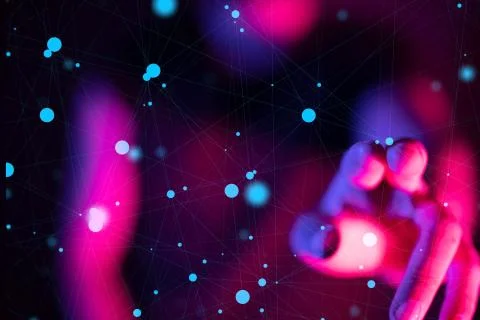 Glowing lights under the bokeh effect behind a person's fingers Stock Photos