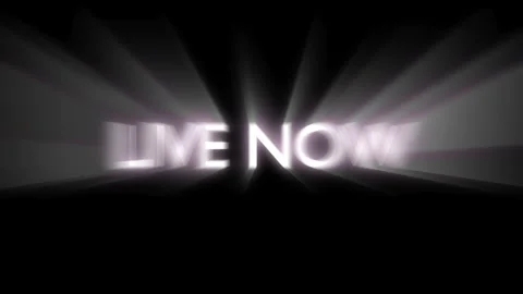 Glowing live now text with spotlight effect on black background Stock Footage 337533900