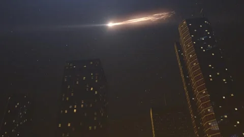 Glowing meteors or space junk Burning in the sky at night Stock Footage 247873343