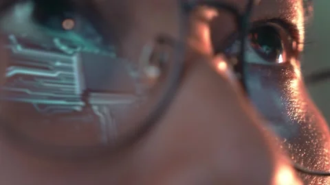 A glowing microchip and circuit patterns on the lenses. Stock Footage 317988290