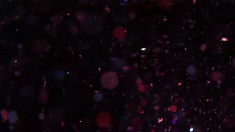 Glowing moving red light and bokeh on dark backdrop Stock Footage 107445422