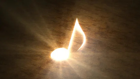 Glowing musical note on the table. The magic of music. Note with rays of light Stock-Footage 106252522