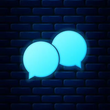 Glowing neon Blank speech bubbles icon isolated on brick wall background. Vector Illustrazione stock