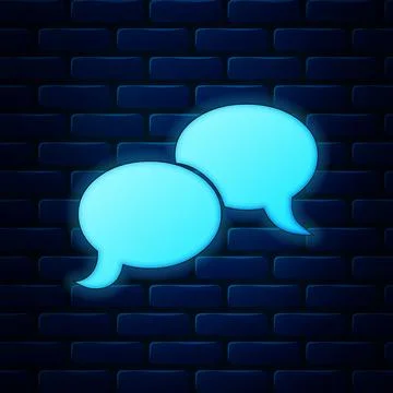 Glowing neon Blank speech bubbles icon isolated on brick wall background. FAQ Stock Illustration