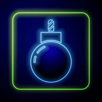 Glowing neon Bomb ready to explode icon isolated on blue background. Vector Illustrazione stock
