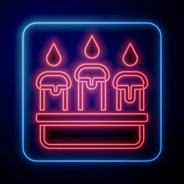 Glowing neon Burning candle in candlestick icon isolated on black background. Stock Illustration