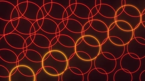 Glowing neon circle pattern background with orange and red overlapping light 스톡 동영상 334140371