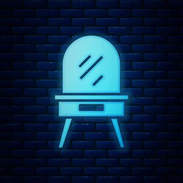 Glowing neon Dressing table icon isolated on brick wall background. Vector イラスト素材
