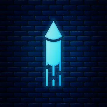 Glowing neon Firework rocket icon isolated on brick wall background. Concept of Stock Illustration