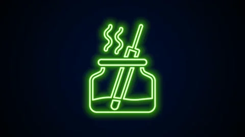 Glowing neon line Aroma diffuser icon isolated on black background. Glass jar Stock Footage 167865417