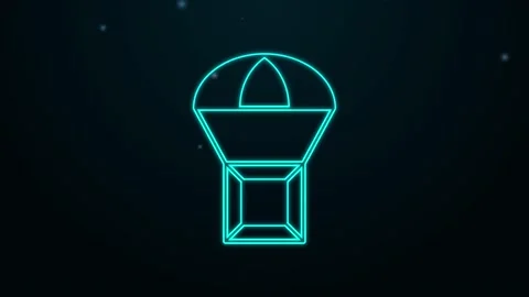 Glowing neon line Box flying on parachute icon isolated on black background Stock Footage 155476220