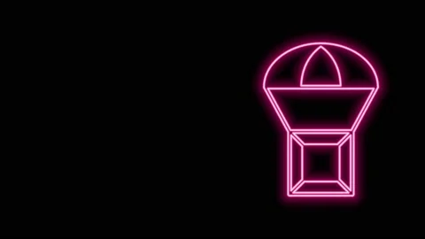 Glowing neon line Box flying on parachute icon isolated on black background Stock Footage 155476221