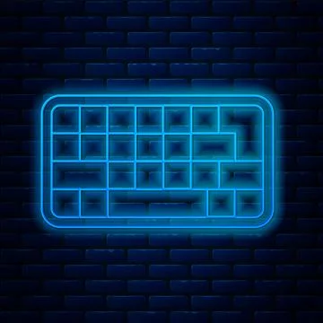 Glowing neon line Computer keyboard icon isolated on brick wall background... Stock Illustration