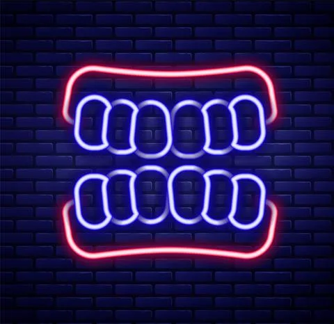 Glowing neon line Dentures model icon isolated on brick wall background. Teeth Illustrazione stock