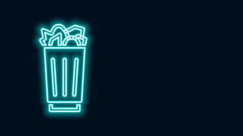 Glowing neon line Full trash can icon isolated on black background. Garbage bin Stock Footage 143227342