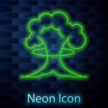 Glowing neon line Nuclear explosion icon isolated on brick wall background. A Stock Illustration