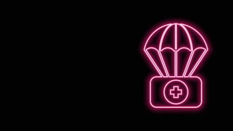 Glowing neon line Parachute with first aid kit icon isolated on black background Stock Footage 141016882