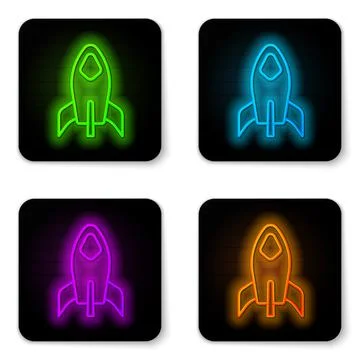 Glowing neon line Rocket ship icon isolated on white background. Space travel Illustrazione stock