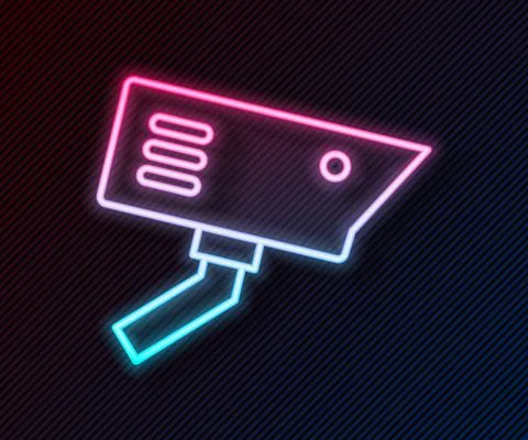 Glowing neon line Security camera icon isolated on black background. Vector Illustrazione stock