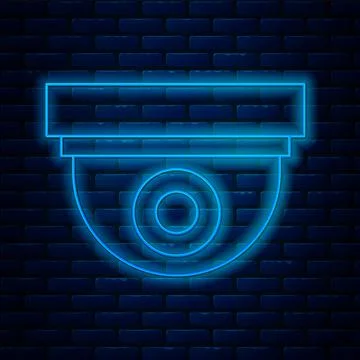 Glowing neon line Security camera icon isolated on brick wall background. Vector Stock Illustration