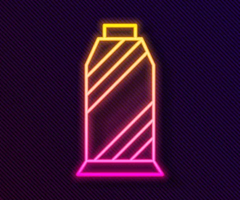 Glowing neon line Sewing thread on spool icon isolated on black background. Yarn Illustrazione stock