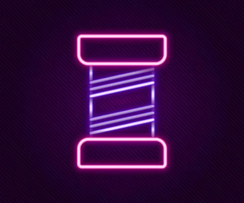 Glowing neon line Sewing thread on spool icon isolated on black background. Yarn Stock Illustration