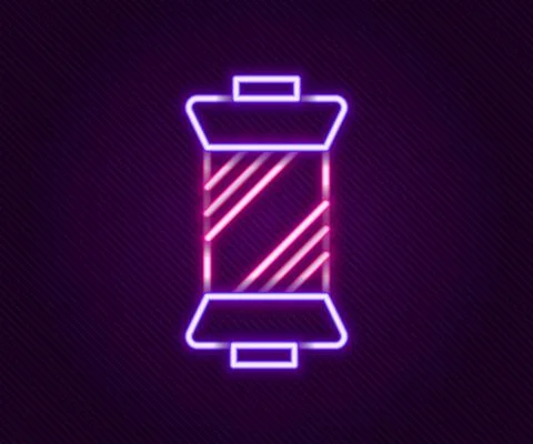Glowing neon line Sewing thread on spool icon isolated on black background. Yarn Illustrazione stock