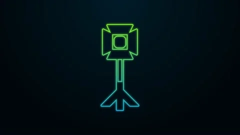 Glowing neon line Studio light bulb in softbox icon isolated on black background Stock Footage 225882501