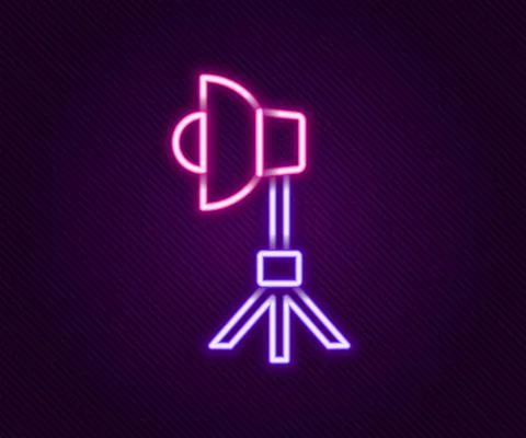 Glowing neon line Studio light bulb in softbox icon isolated on black background Stock Illustration