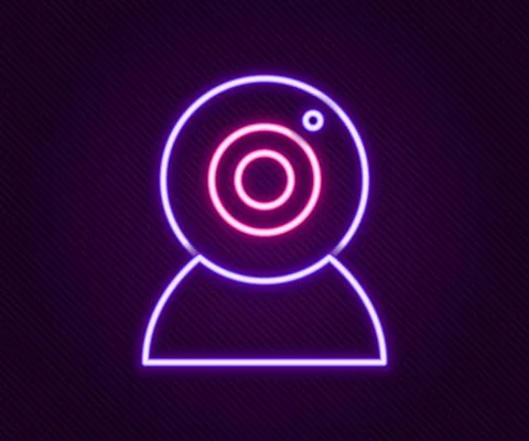 Glowing neon line Web camera icon isolated on black background. Chat camera 스톡 일러스트