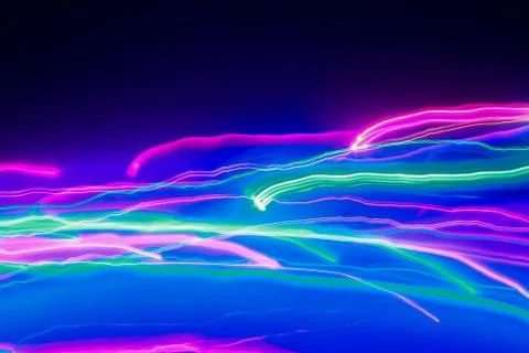 Glowing neon lines. Blue red pink and violet colorful lighting. Stock-Fotos