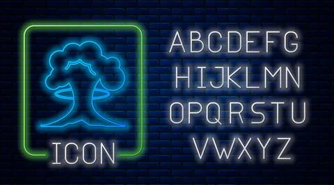 Glowing neon Nuclear explosion icon isolated on brick wall background. Atomic イラスト素材
