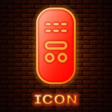 Glowing neon Remote control icon isolated on brick wall background. Vector Illustrazione stock
