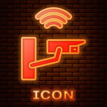 Glowing neon Smart security camera icon isolated on brick wall background Stock Illustration