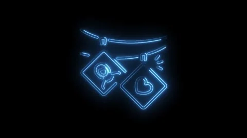 Glowing neon string lights displaying photo prints with heart and smiley face Stock Footage 330771991