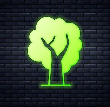 Glowing neon Tree icon isolated on brick wall background. Forest symbol.  V.. Illustrazione stock