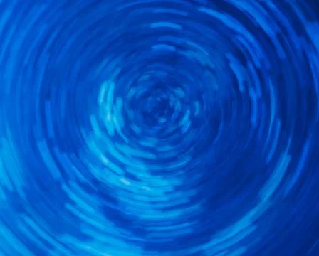 Glowing neon vortex blur light flare blue circle Foto stock