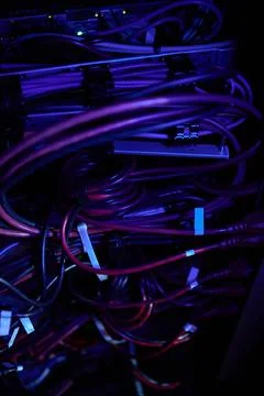Glowing Network Cables in Server Rack with LED Lights Stock Photos
