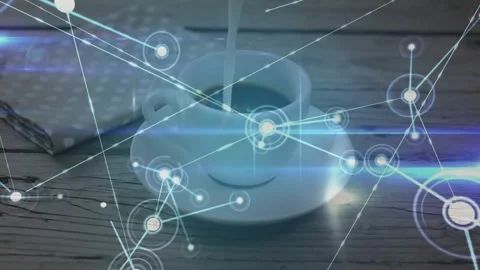 Glowing node pulsing above white ceramic coffee cup, sending network branches Video stock 328974810