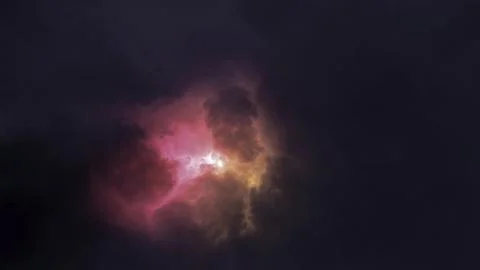 A glowing object floats against a dark backdrop, pulsing with color. Motion Stock Illustration