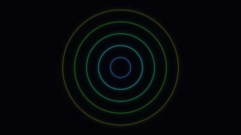 A glowing orange circular ring with a central point against dark background Video stock 335117406