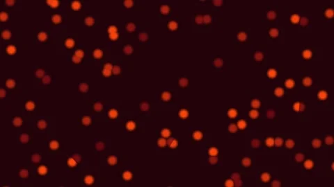 Glowing Orange Particles and Bokeh Lights Motion Background for Halloween. Stock Footage 344864464