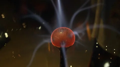 Glowing Orange Plasma Ball With Electric Discharges in Dark Background Stock Footage 346652234