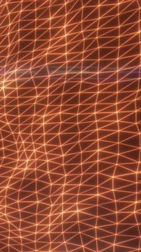 Glowing orange polygon mesh with connected lines and nodes, creating a futu.. Stock Photos