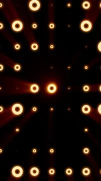 Glowing orange ring lights on black background with soft rays, abstract lum.. イラスト素材