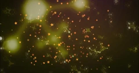 Glowing orange star particles drifting across abstract screen, with neon Fotos de archivo