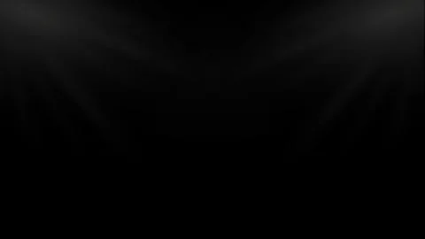A glowing overhead light beam resembling a spotlight 스톡 동영상 312806111