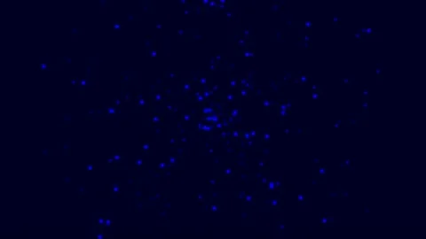 Glowing particles burst in a dark Stock-Footage 339373211
